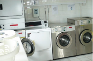 Our camping site has a large laundry room with washing machines and dryers